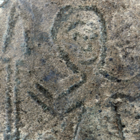 słowiańska rzeźba kultowa (Jarowit?) w południowej ścianie prezbiterium kościoła Św. Piotra (obraz poddany przetworzeniu)